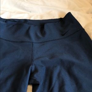 Dark blue Nike leggings.